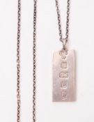 A 20th Century silver pendant with Jubilee marks. On a white metal chain. 20.1g gross.