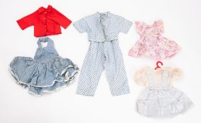 A mixed collection of Barbie clothes and accessories. Including dresses, trousers and jackets etc.