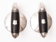 A pair of late 19th/early 20th century nickel plated and ebony curling stone handles the handle