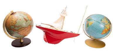 A Tri-an 'Osprey' pond yacht, set with sails over moulded deck and red weighted hull, 60cm long,