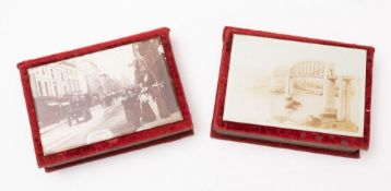 Two late 19th century red velvet and photographic table boxes, one with a view of the Tamar Bridge,