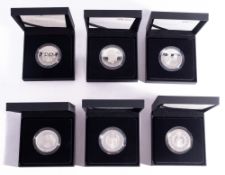 Two Royal Mint Platinum Wedding 2017 Piedfort coins with four other Royal silver proof coins.