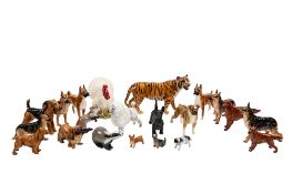 A collection of seventeen Beswick dogs.