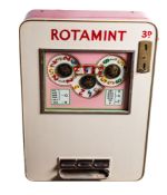 A mid 20th century German 'Rotamint' wall mounted slot machine,