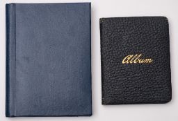 An early 20th Century autograph album containing photographs and facsimile signatures.