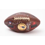A signed limited edition New England Patriots Superbowl XXXVI American football.