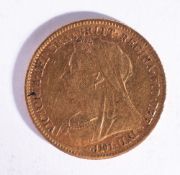 A 1900 half Sovereign coin.