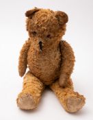 A 20th Century blonde plush Teddy bear.