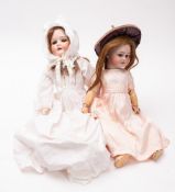 An early 20th Century German bisque head doll.