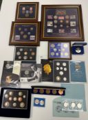 A collection of coins in sets, frames, including silver proofs, Benjamin Britten 50p,