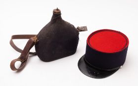 An early 20th Century French Foreign Legion water bottle and kepi.