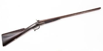 An early 20th Century W Lee, Birmingham 12 gauge pin fire side by side muzzle loading shotgun.