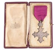 A George V Military MBE in case of issue, maker Garrard & Co, London ,