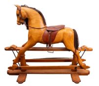 A mid 20th Century John Neusinger rocking horse oak rocking horse.