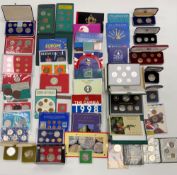 A collection of forty seven coins sets/cased singles from different countries of the world.