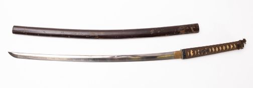 A Japanese Katana, the slightly curved single edge blade with hamon, and signed to tang,