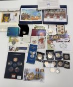 A collection of coins including Westminster, coin covers, some silver.