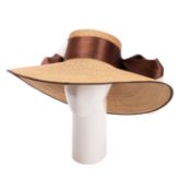 A lady's large straw hat, maker Herald & Heart, London,