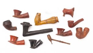 A collection of eleven various 19th Century pipe bowls,
