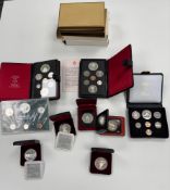 Canada, a collection of nine coin sets/dollars etc. including silver.