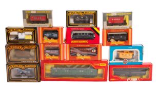 A collection of OO/HO gauge goods wagons.