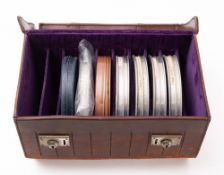 Seven early 20th Century film reels.