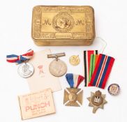 A brass 1914 Christmas tin.