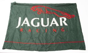 A 20th Century Jaguar Racing advertising flag.