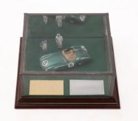 A 1/43rd scale white metal diorama 'Aston Martin DBR1.