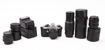 An Asahi Pentax ME Super camera outfit.