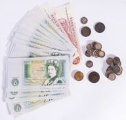 A collection of 20th Century British coins and banknotes.