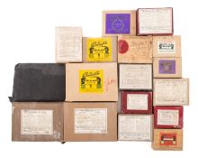 A collection of early 20th Century glass negatives.