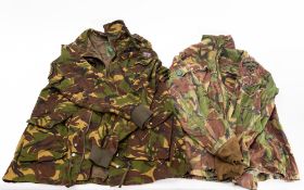 Two canvas camouflage field packs.