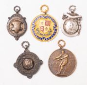 Five early 20th Century Sporting medals. Mainly football related including three silver examples.