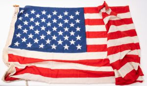 A 20th Century United States of America flag. Of cotton construction, 178cm long, 86cm wide.