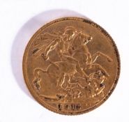 A 1915 Sovereign coin.