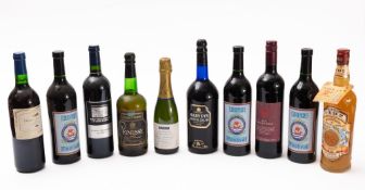 A collection of twenty-one bottles of wines and spirits.