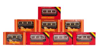 Eight Hornby OO/HO four wheel passenger coaches.