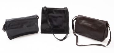 Four Tula leather handbags.