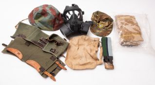 A collection of post WWII military style clothing.