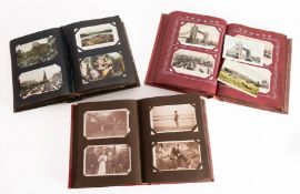 A collection of early 20th Century postcards.