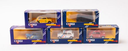 Five Corgi Mini Coopers. In a range of liveries, all boxed.