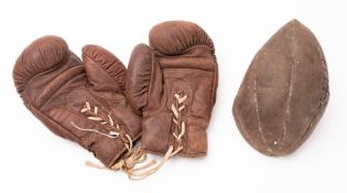 Two 1930s leather footballs.
