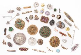 A collection of silver and yellow metal brooches. Together with a range of enamel badges etc.