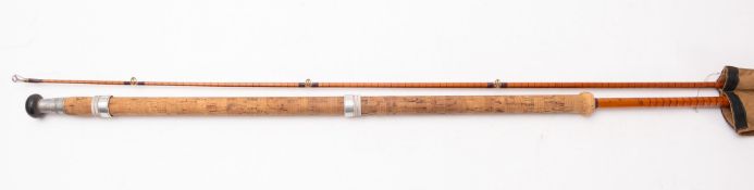 A B James and Son S/U MkIV two piece split cane carp fishing rod. In original cloth bag.