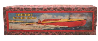 A Hornby tin plate clockwork speed boat.