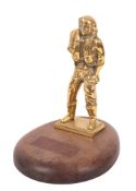 A 20th Century brass model of an airman