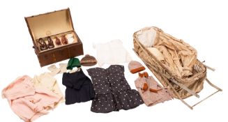 An early 20th Century dolls trunk and co