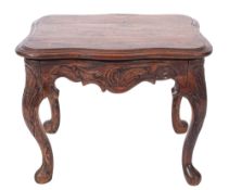 A carved walnut low table, George II, mi
