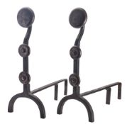 A pair of wrought iron fire dogs, in Art